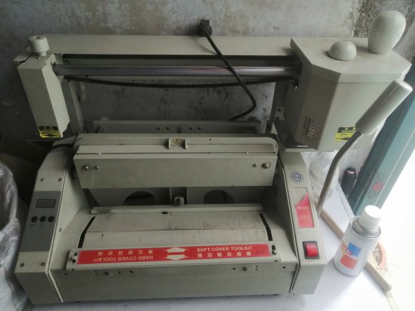 6成新手动胶装机